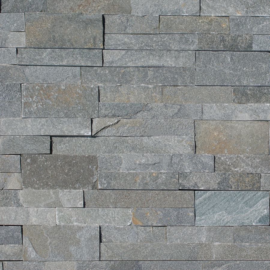 A close up of a gray stone wall