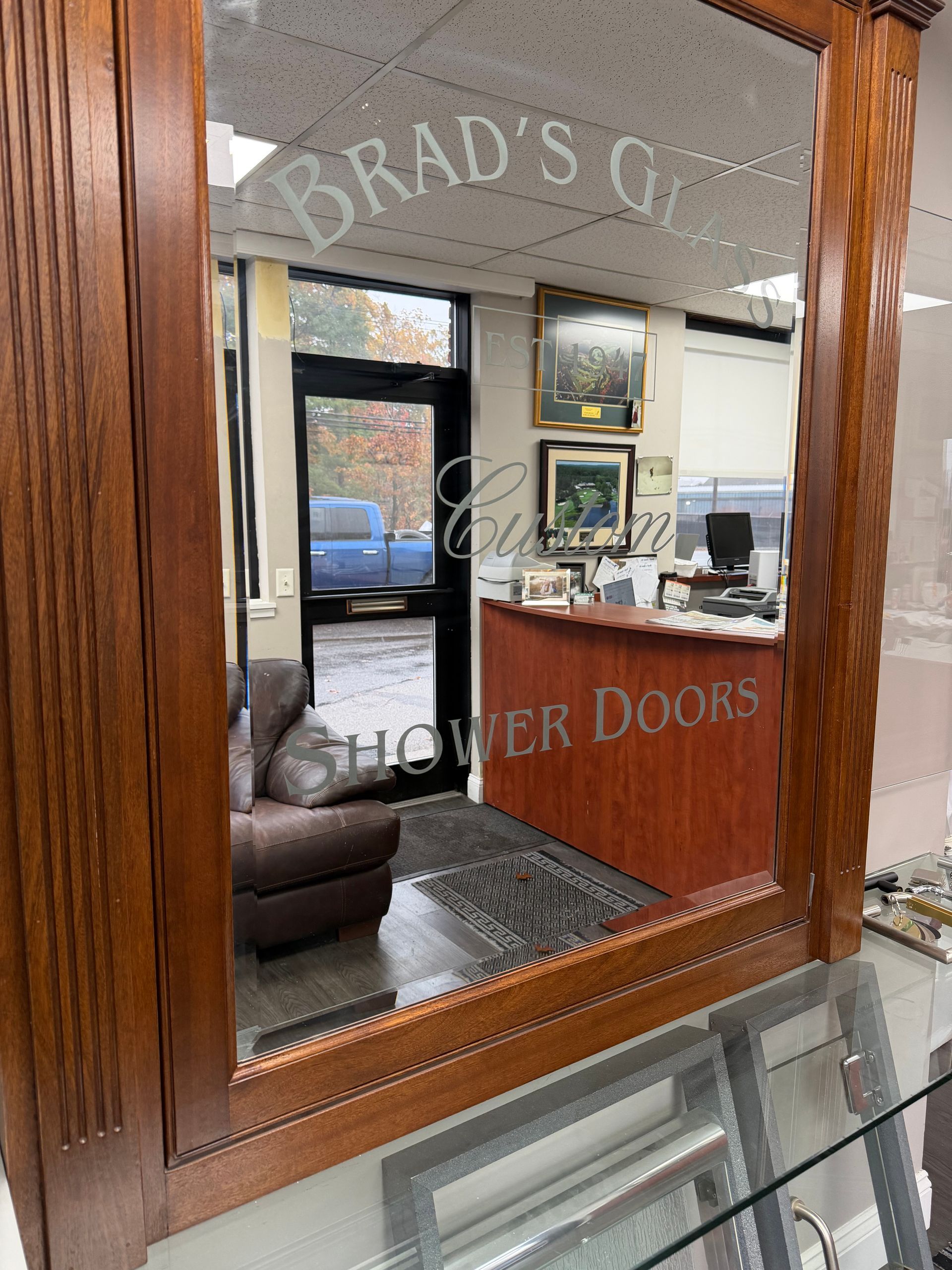 Mirror reflecting a business interior; 