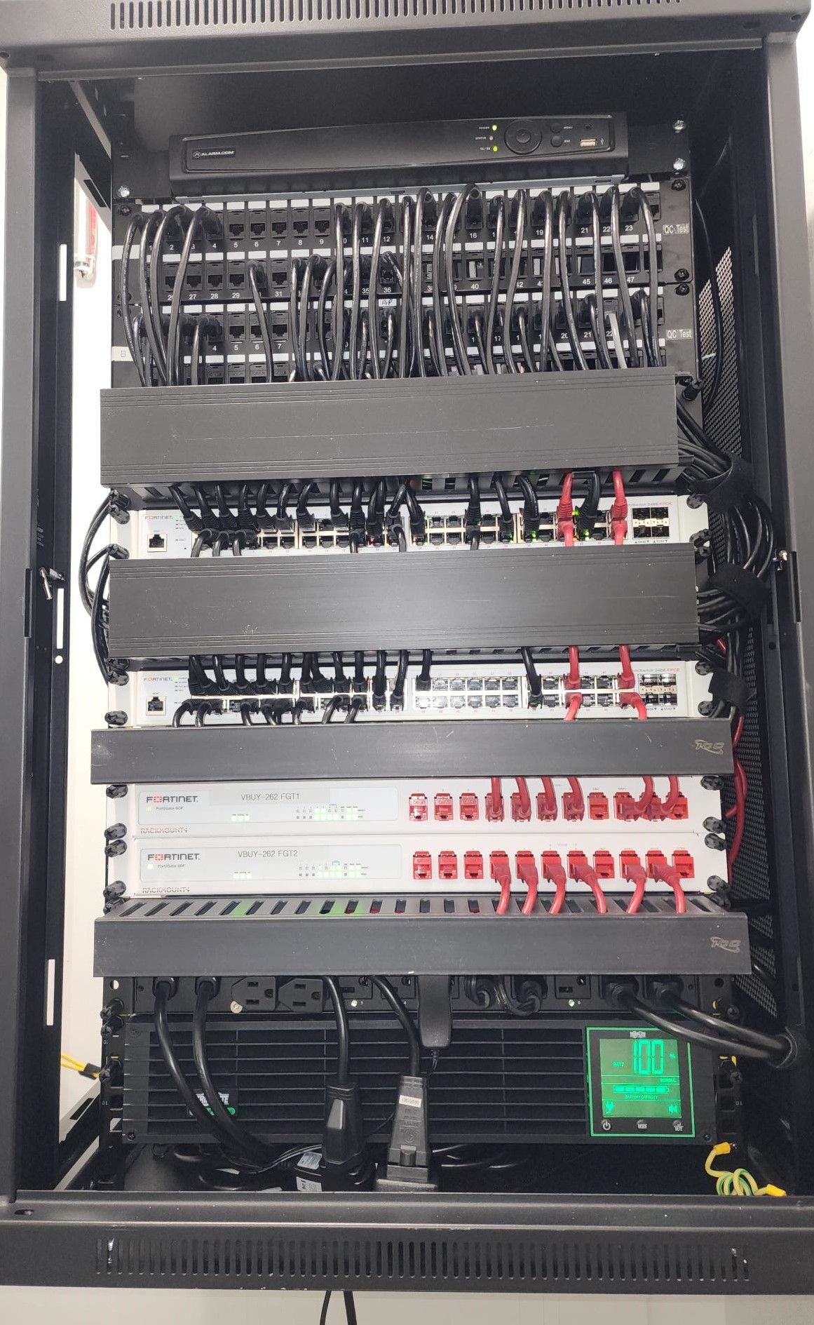 A server rack with a lot of wires
