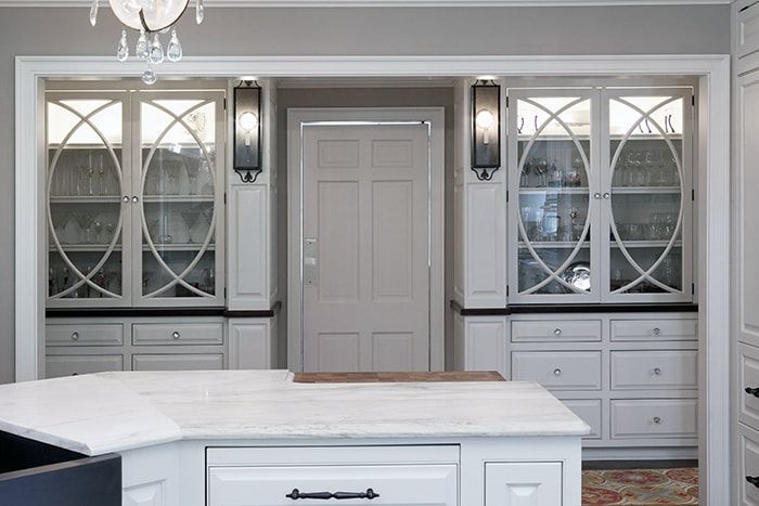 There is a large island in the middle of the kitchen.