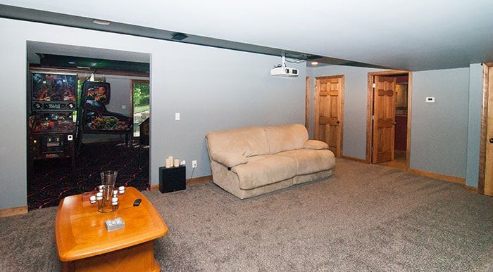 A living room with a couch and a coffee table