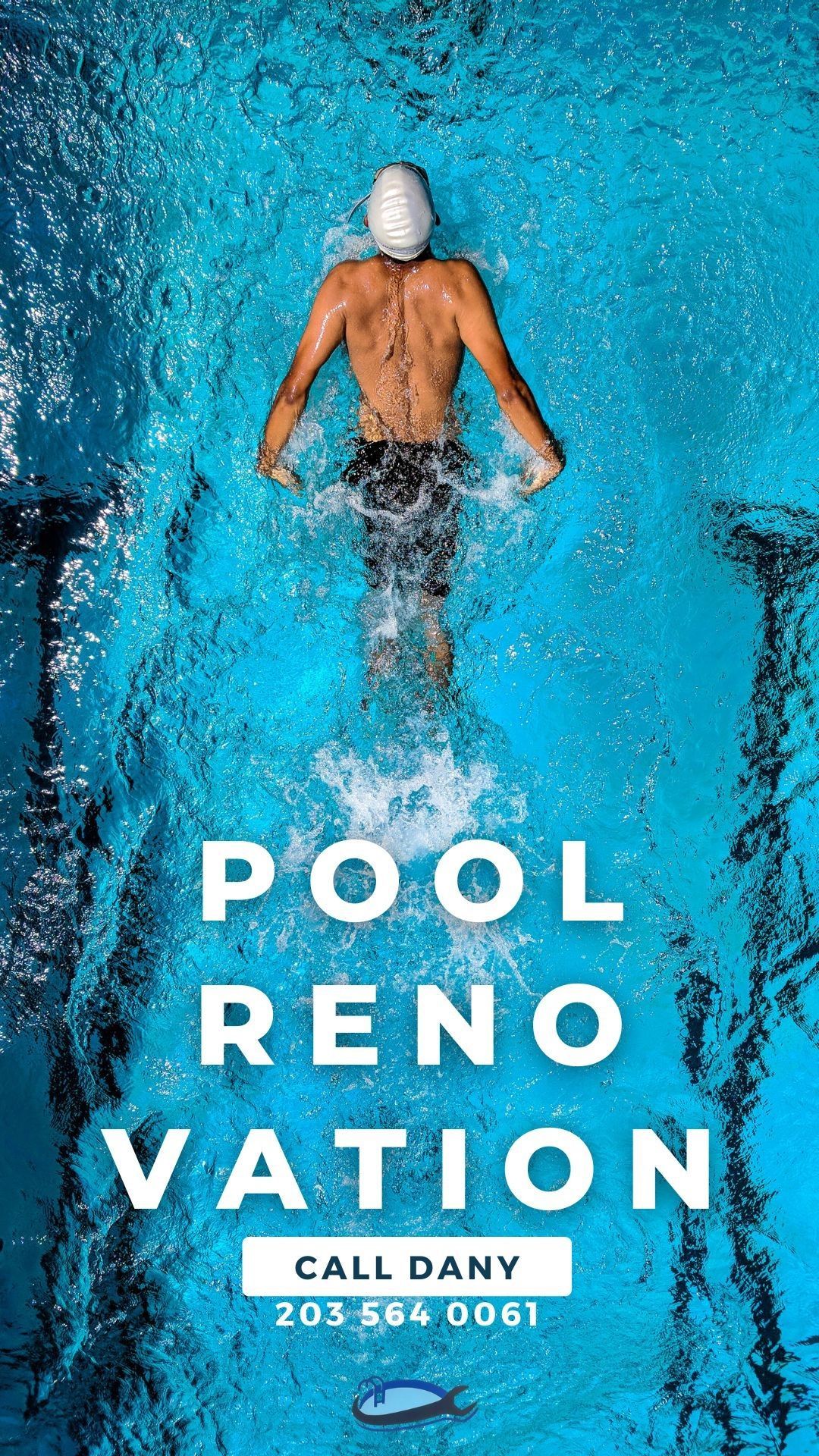 A man is swimming in a swimming pool.