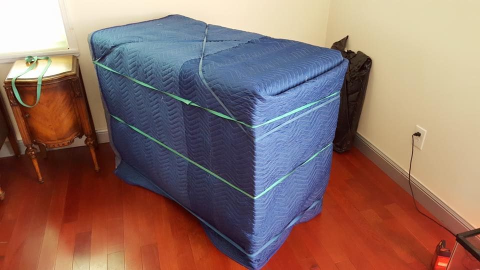 item packed in moving blanket