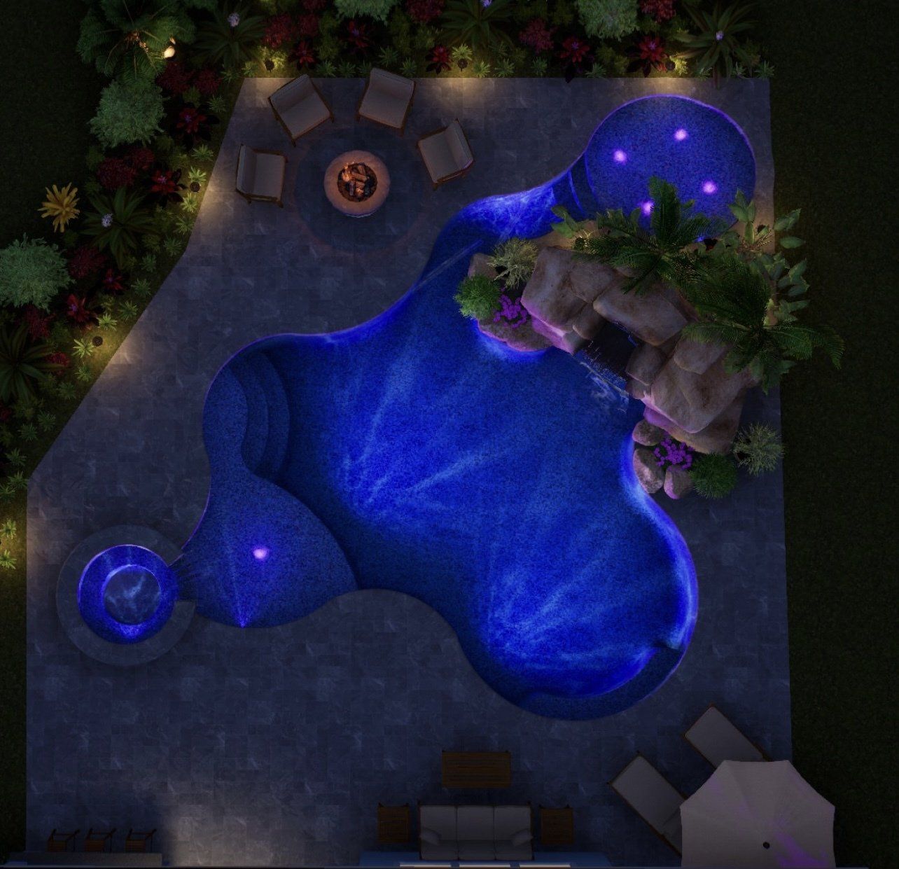 Aerial view of a backyard pool with blue water, a rock feature, a fire pit, and seating areas, illuminated at night.