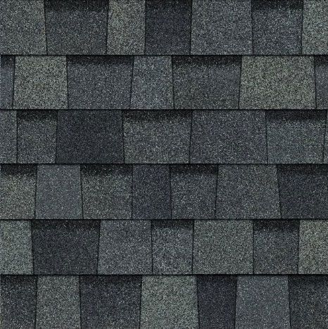 A close up of a row of shingles on a roof.