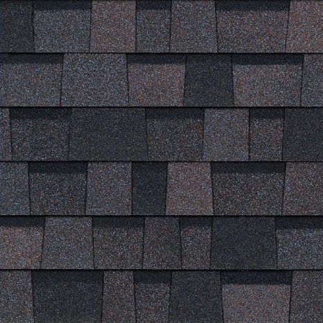 A close up of a row of shingles on a roof.