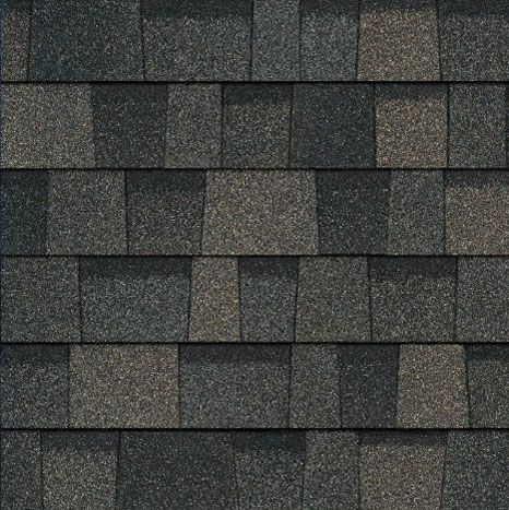A close up of a roof with shingles on it.