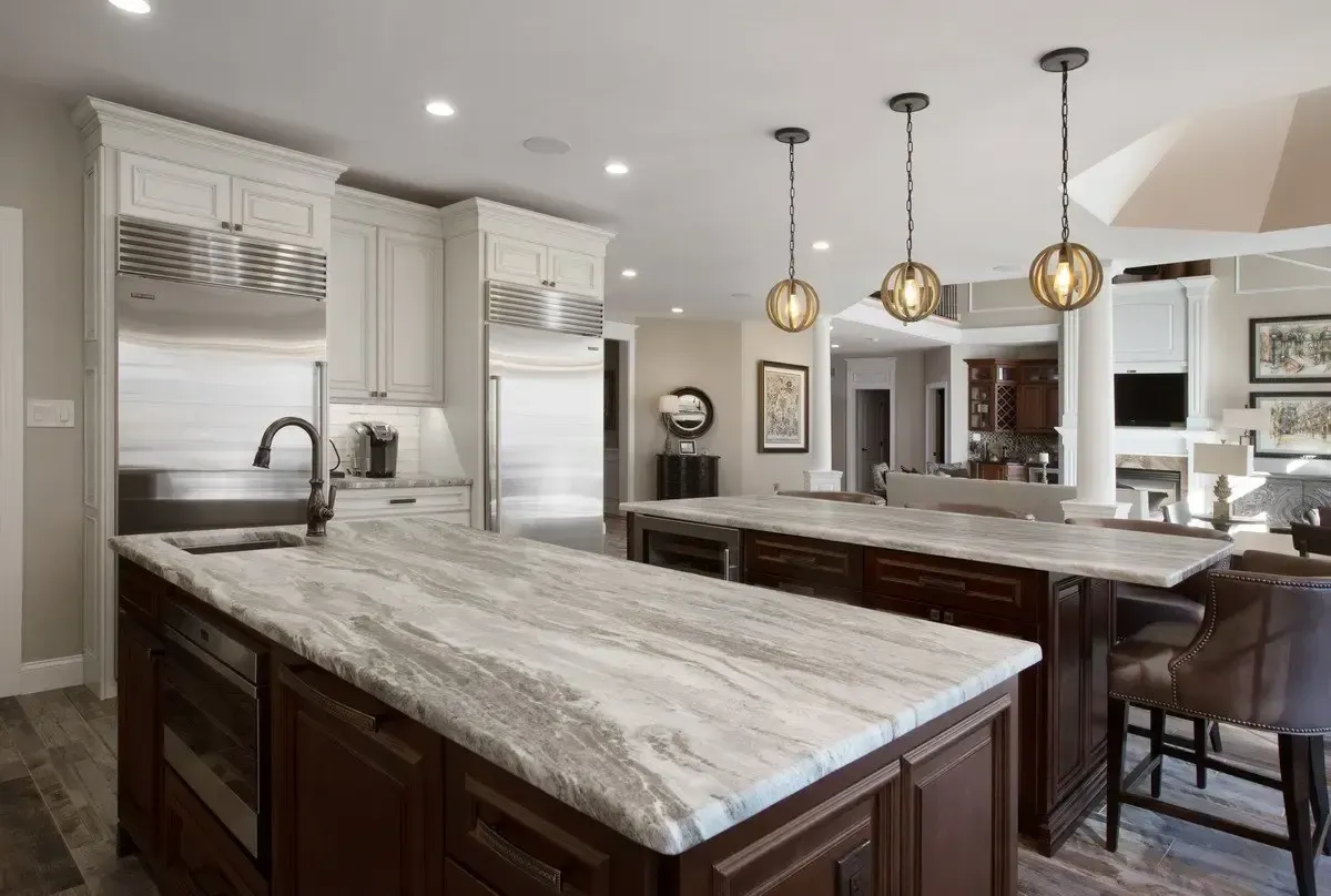 There is a large island in the middle of the kitchen.