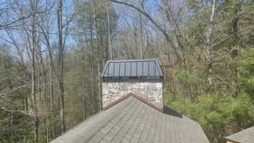 Residential metal roof with windows