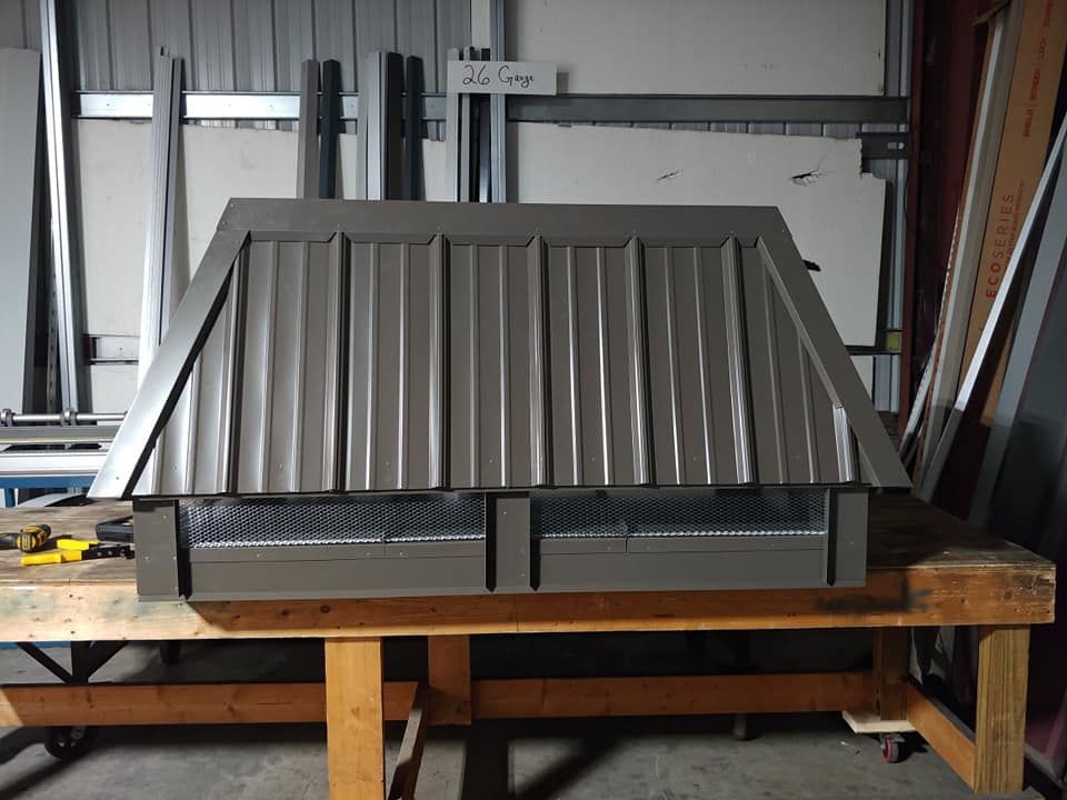 A piece of metal sitting on top of a wooden table