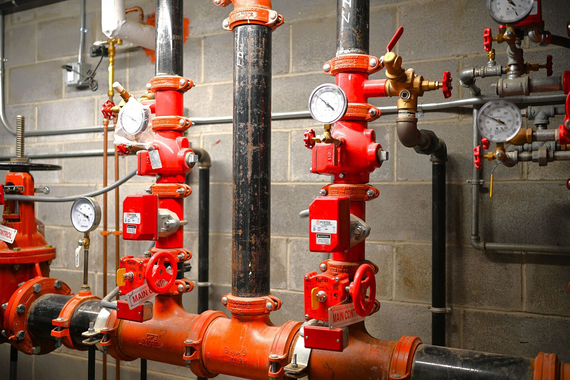 A room filled with lots of pipes and valves