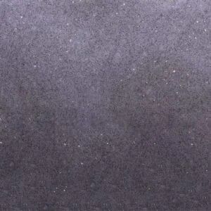 Gray, textured background with subtle white specks, darkening toward the bottom.