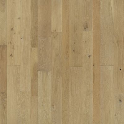 Light brown hardwood flooring with natural grain and knot details.