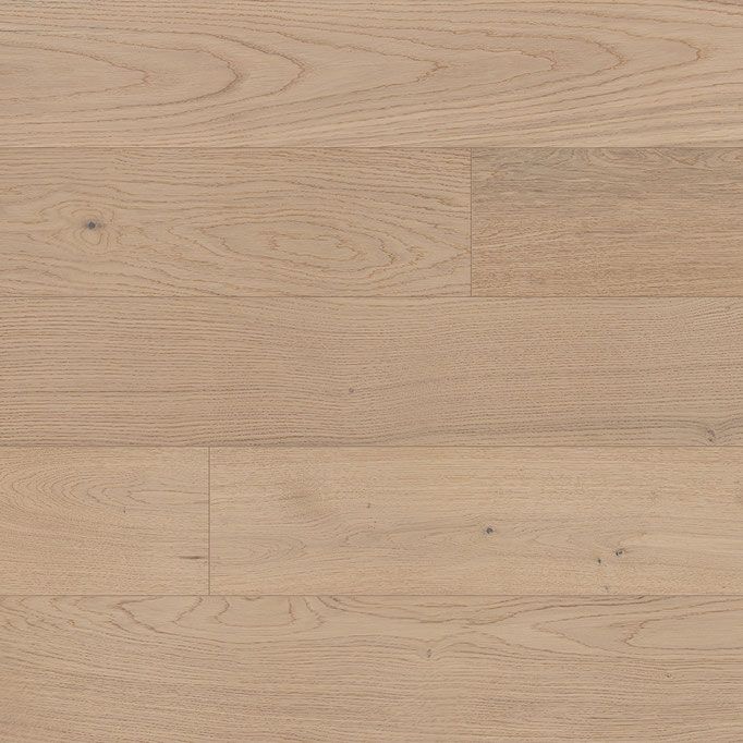 Light brown wood flooring with natural grain patterns.