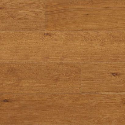 Close-up of golden brown wood flooring with visible grain and knots.