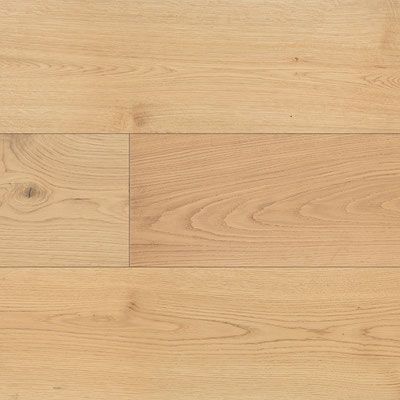 Light-colored wood flooring with visible grain and knots, typical for residential use.