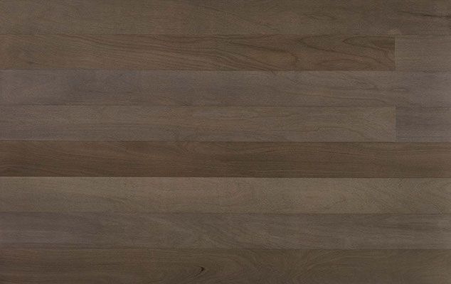 Wood flooring with varying shades of brown.