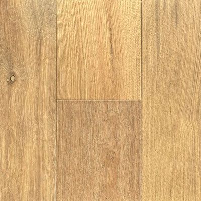 Light brown wood flooring with vertical grain and some knots.