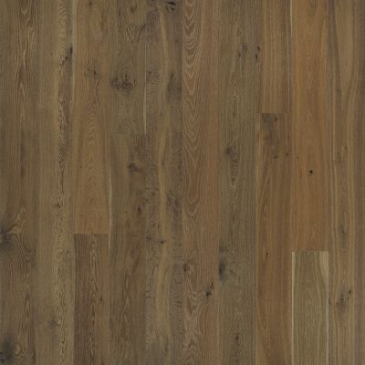 Brown hardwood floor with varying shades and wood grain.
