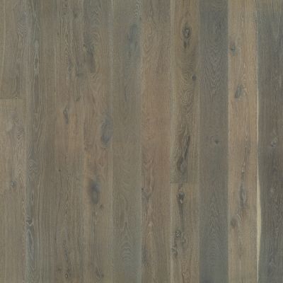Gray and brown-toned wood flooring with vertical planks and natural wood grain.