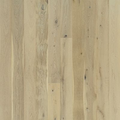 Light-colored wood flooring with vertical planks and visible grain patterns and knots.