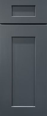 Close-up of a charcoal-grey cabinet door with a rectangular recessed panel.