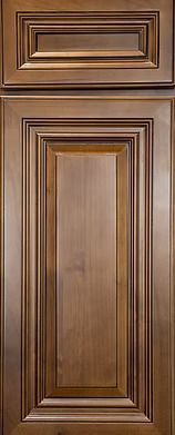 Close-up of a brown, raised panel cabinet door with intricate molding details.