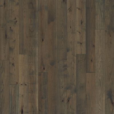 Dark brown wood flooring with varied wood grain patterns.