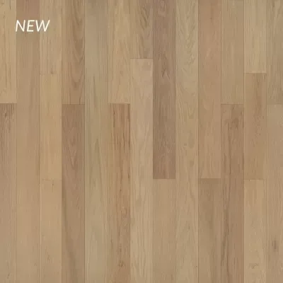 Light-toned hardwood flooring with vertical wood planks;