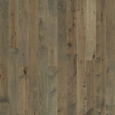 Wooden flooring with various shades of brown and gray.