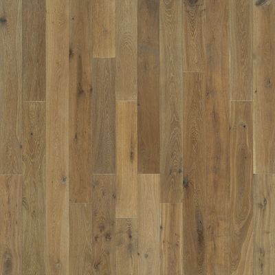Light brown wood flooring with varied grain patterns.