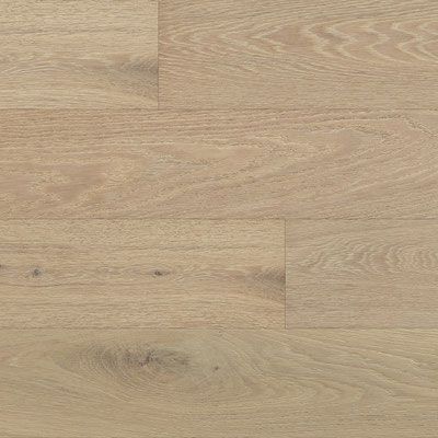Light-colored wood flooring with visible grain patterns, laid in planks.