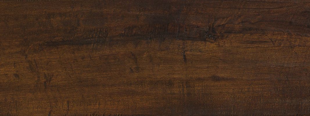 Dark brown wood grain texture.