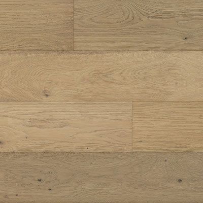 Light brown wood flooring with visible wood grain and knots.