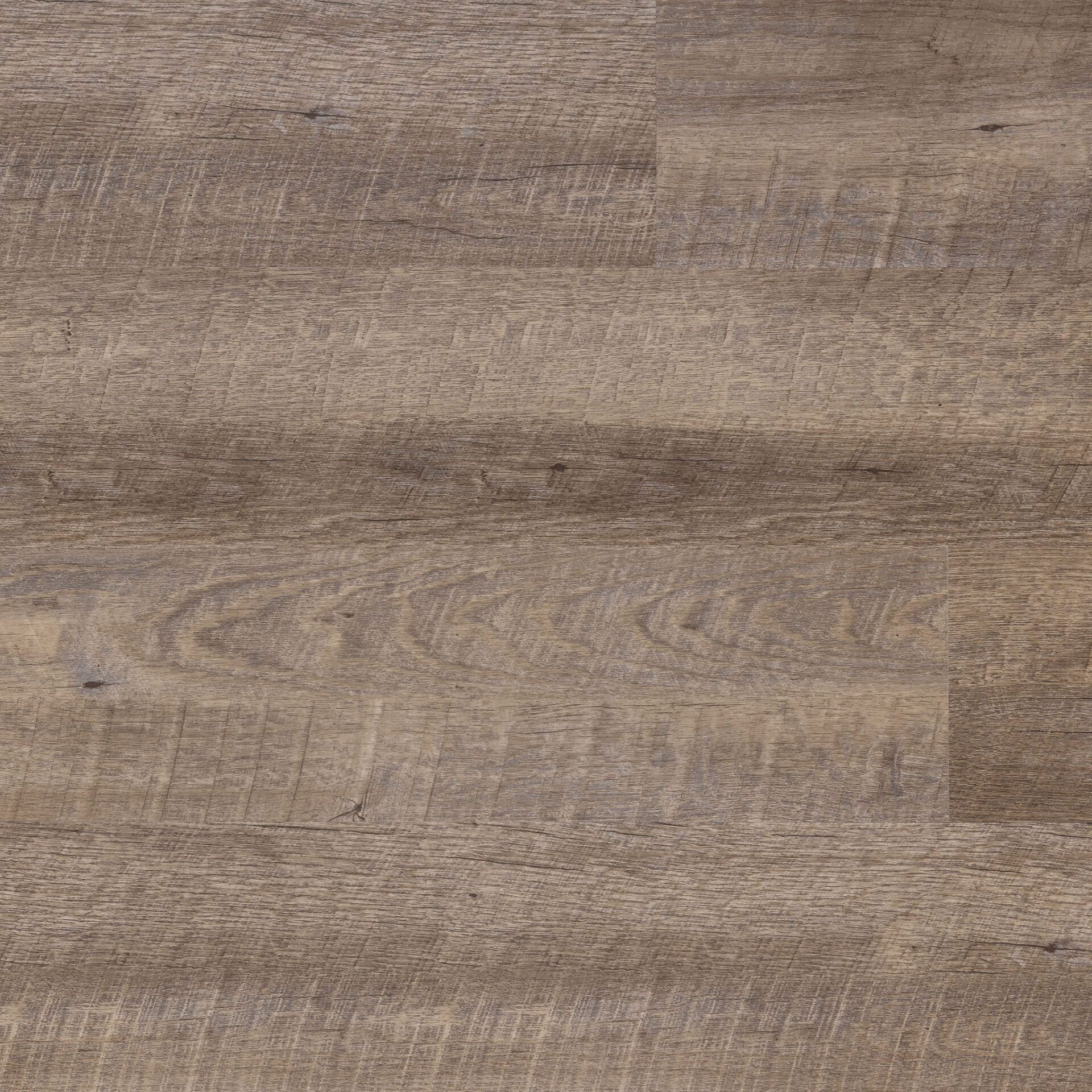 Close-up of weathered, brown wood flooring. Horizontal planks with visible grain and knots, varying shades of brown.