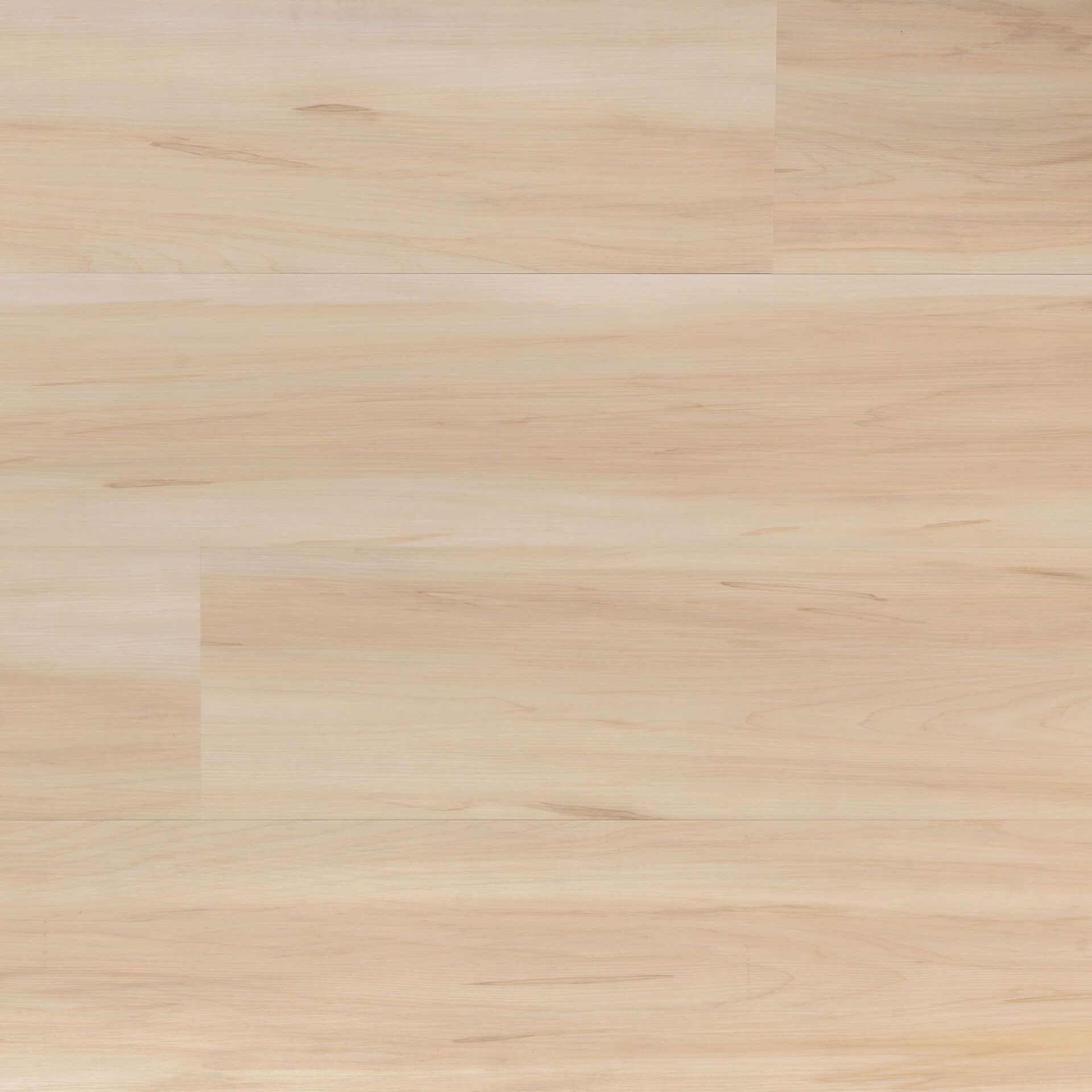 Light-colored wood flooring with horizontal planks and subtle grain details.