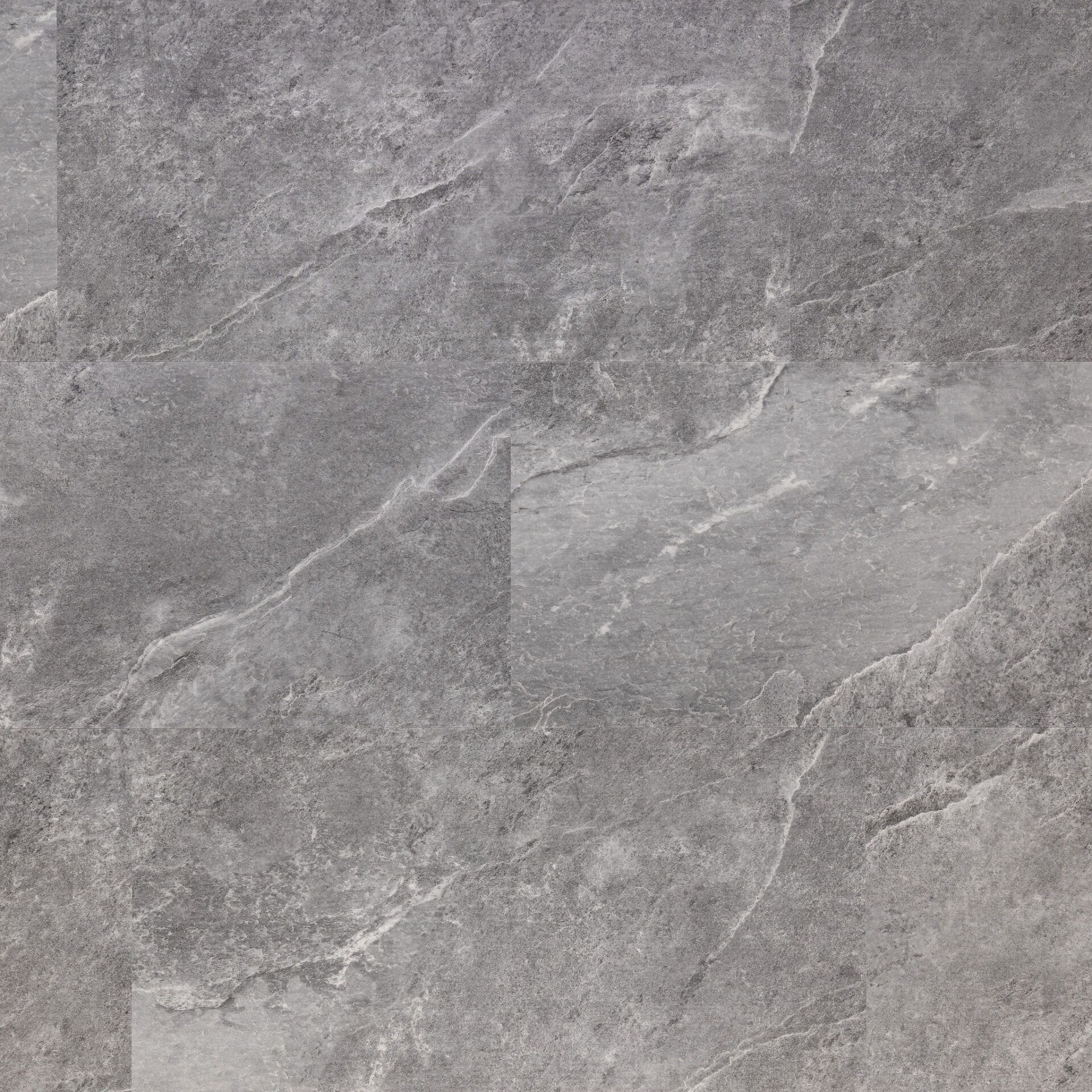 Gray stone tile flooring with light veining.