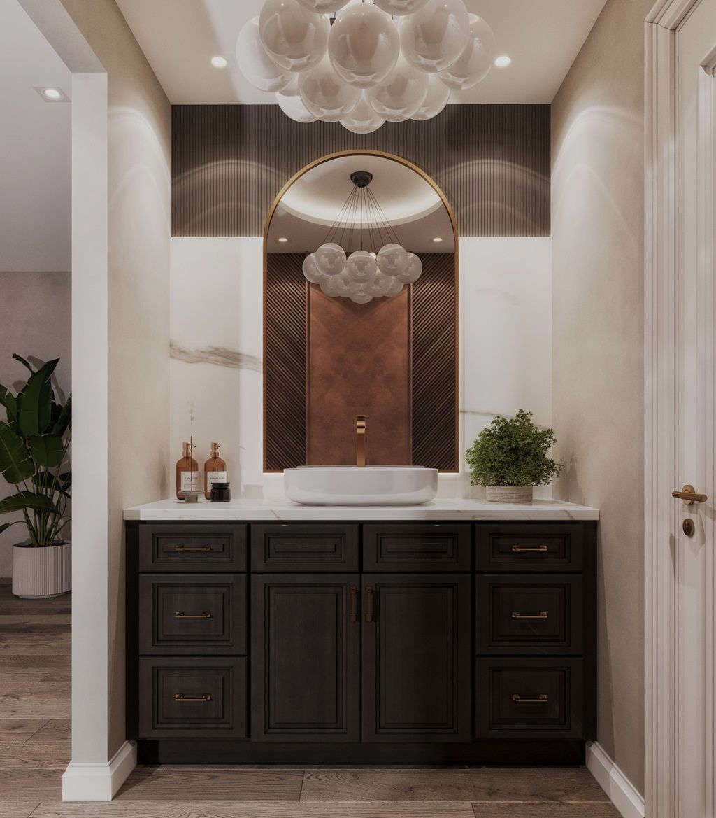 Dark vanity with white countertop, arched mirror, and cloud-like light fixture in a modern powder room.