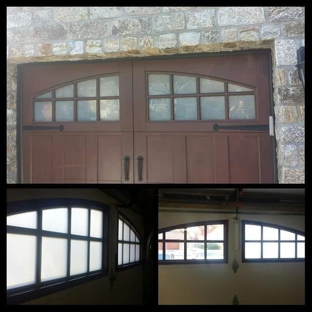 A brown garage door with arched, multi-pane frosted windows, shown from the exterior and interior views.