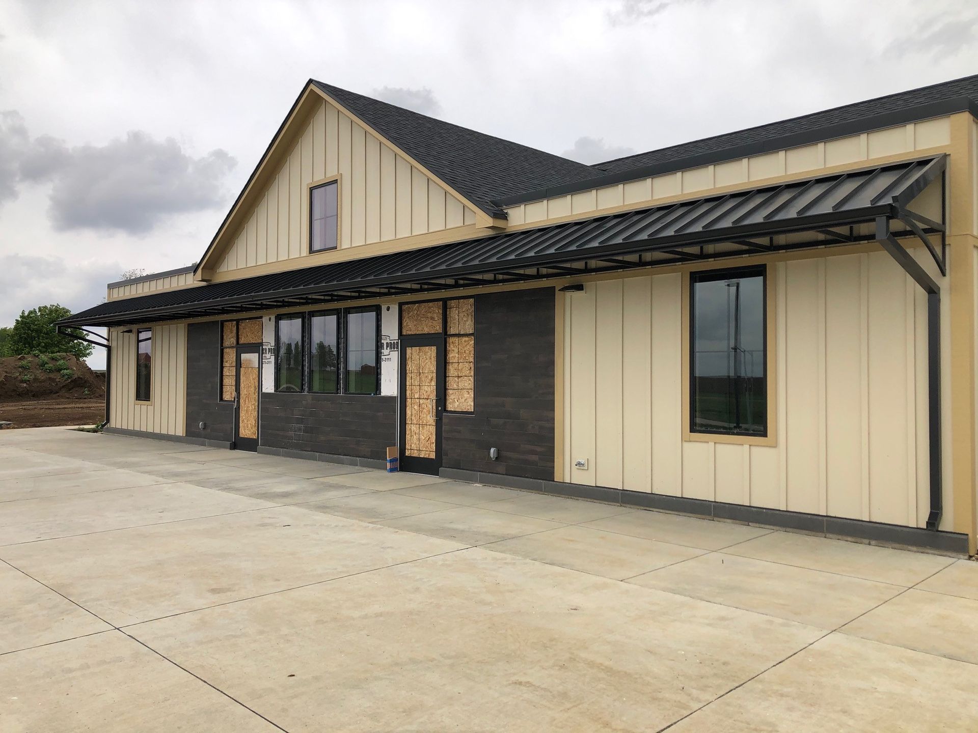 A large building with a lot of windows is being built.