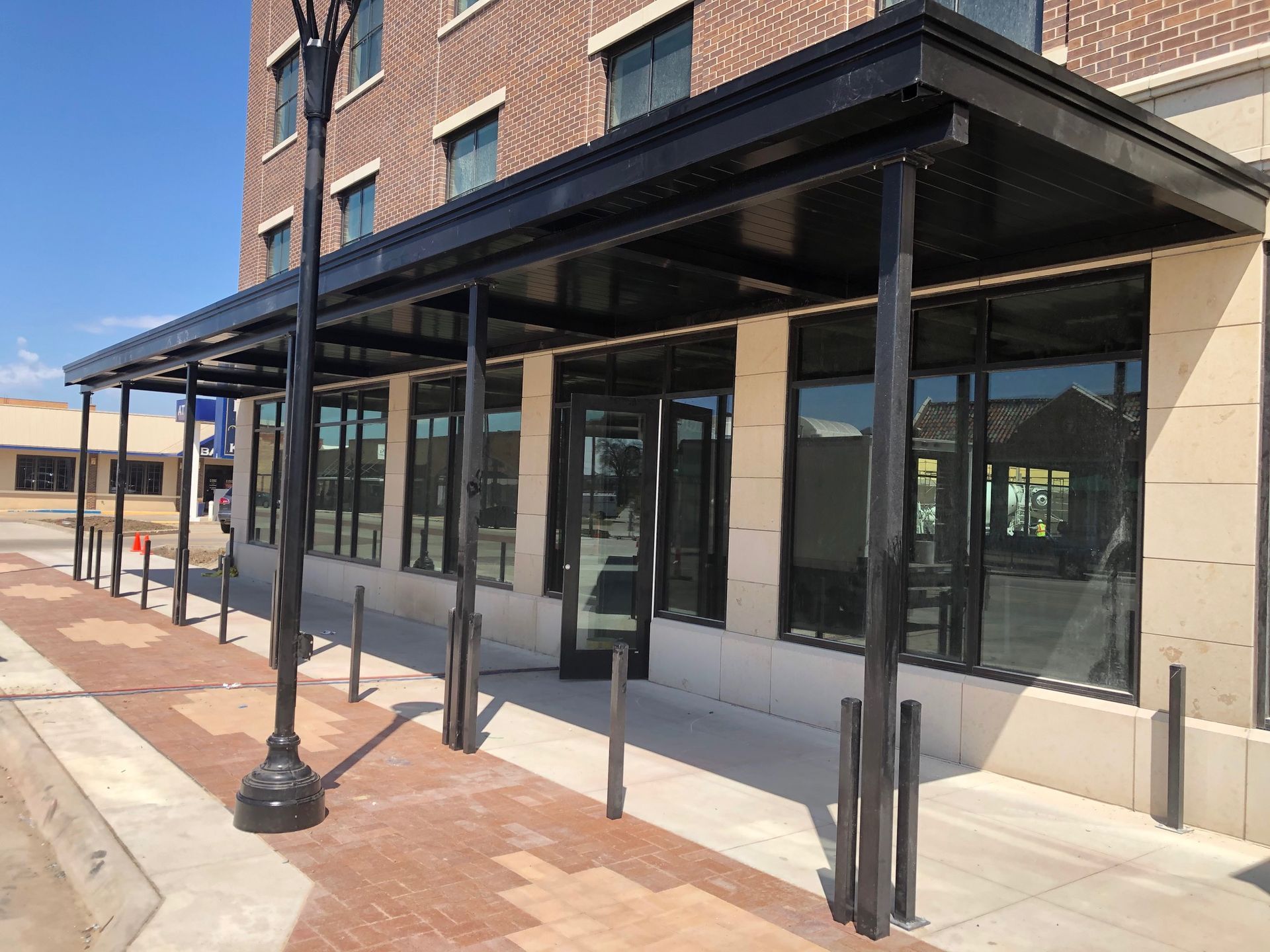 A building with a canopy over it and a lot of windows.