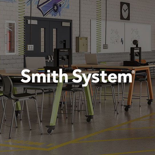 Smith System logo with a green and black circular road design, and text