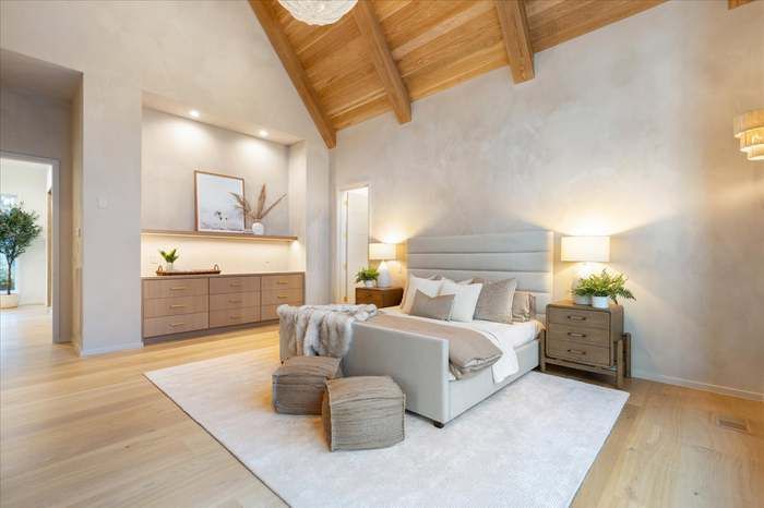 There is a large bed in the middle of the room.