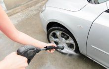 Pressure wash on car's wheel
