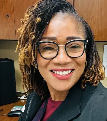 Photo of {{Team Member Name}}