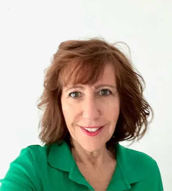 Photo of {{Team Member Name}}