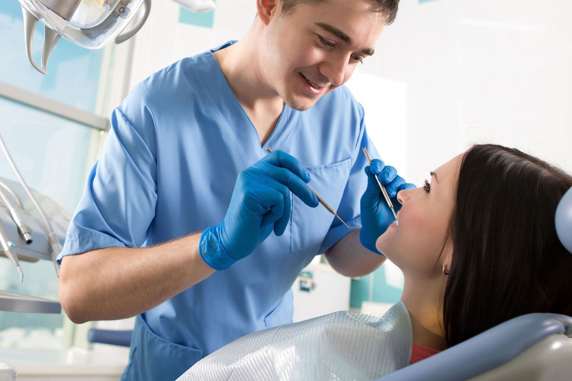 Dentist examining a patient
