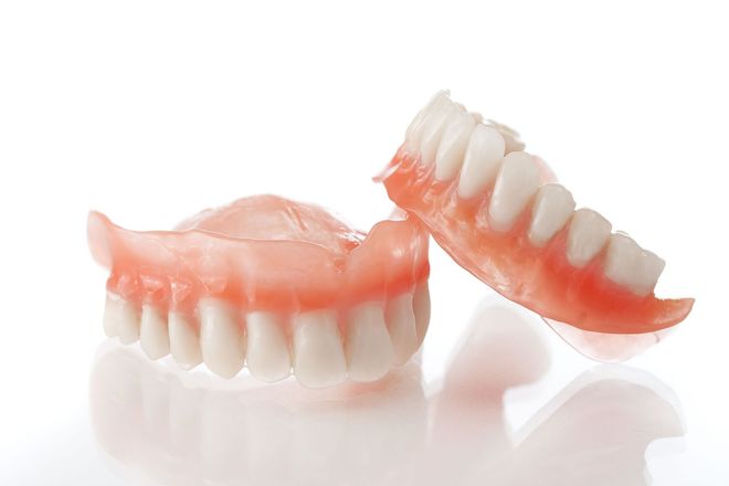 Pair of pink and white removable dentures