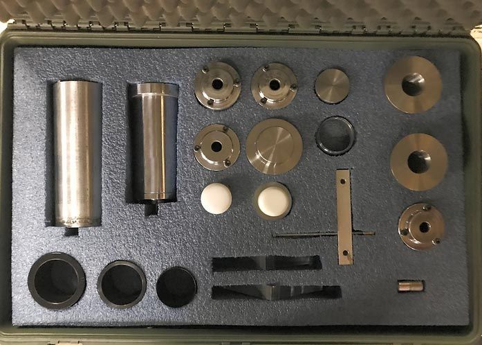 A box with a lot of metal pieces in it