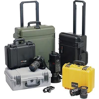 A group of cases with cameras and lenses in them.